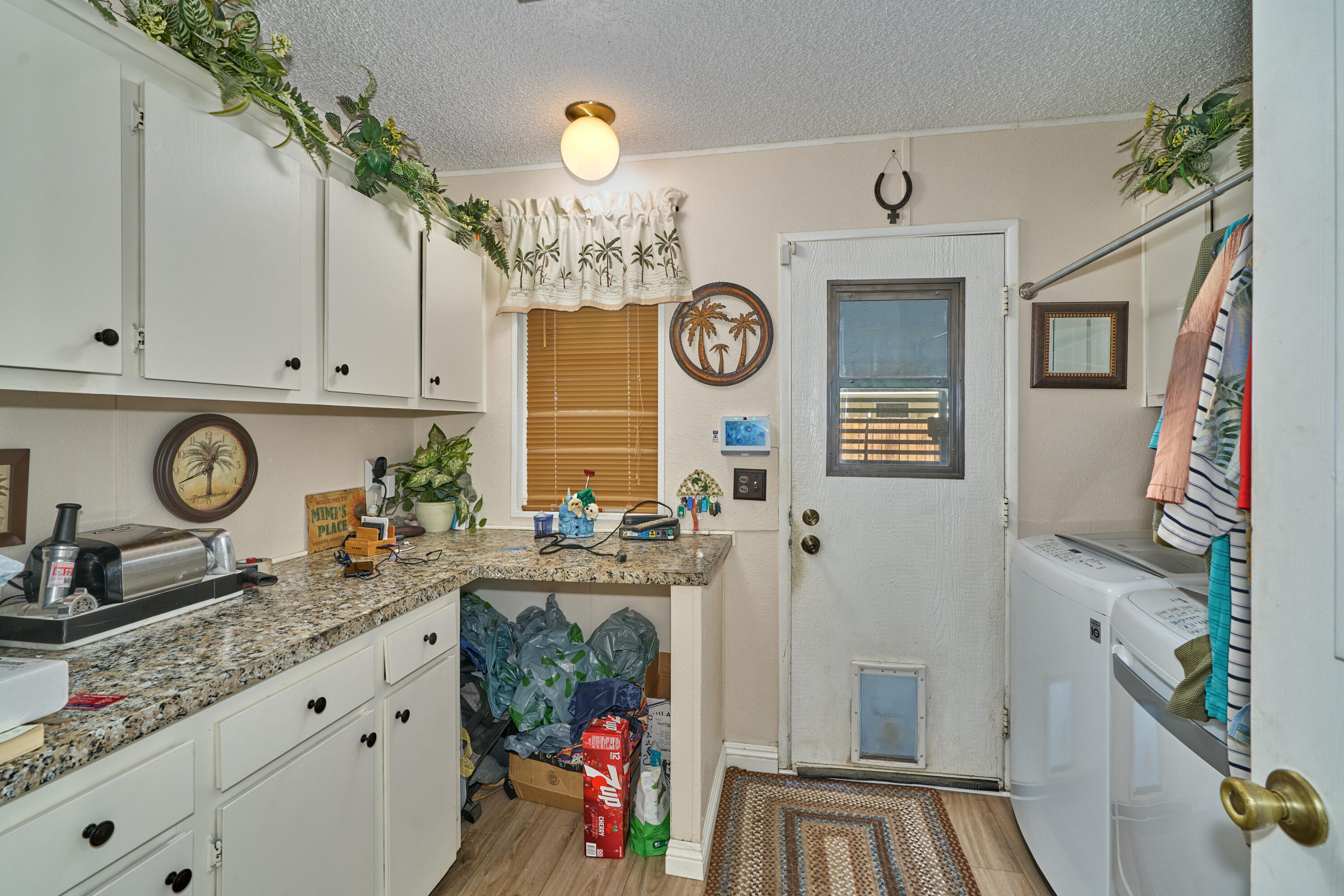 33537 Lisa Circle Thousand Palms, CA 92276 - Photo 18 of 35 a kitchen with stainless steel appliances granite countertop a stove and cabinets