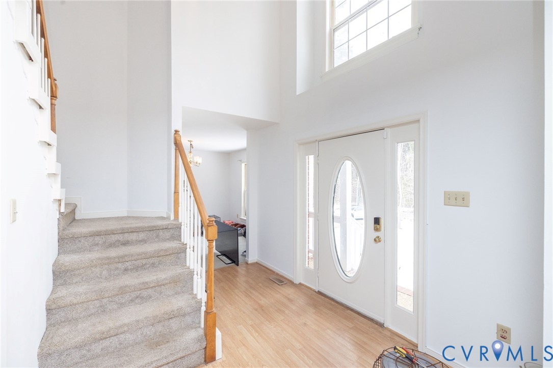 10 Rhodes Lane Cartersville, VA 23027 - Photo 2 of 16 Foyer entrance featuring light wood finished floor