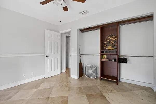 a view of a room with window and a livingroom