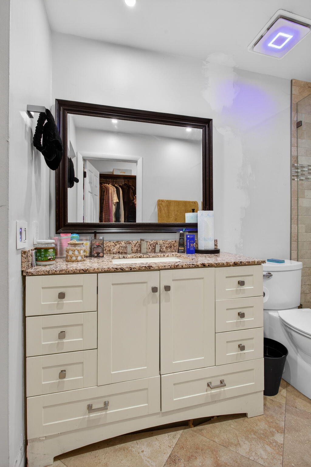 415 Southwest 61st Terrace Margate, FL 33068 - Photo 21 of 39 a bathroom with a sink vanity and mirror