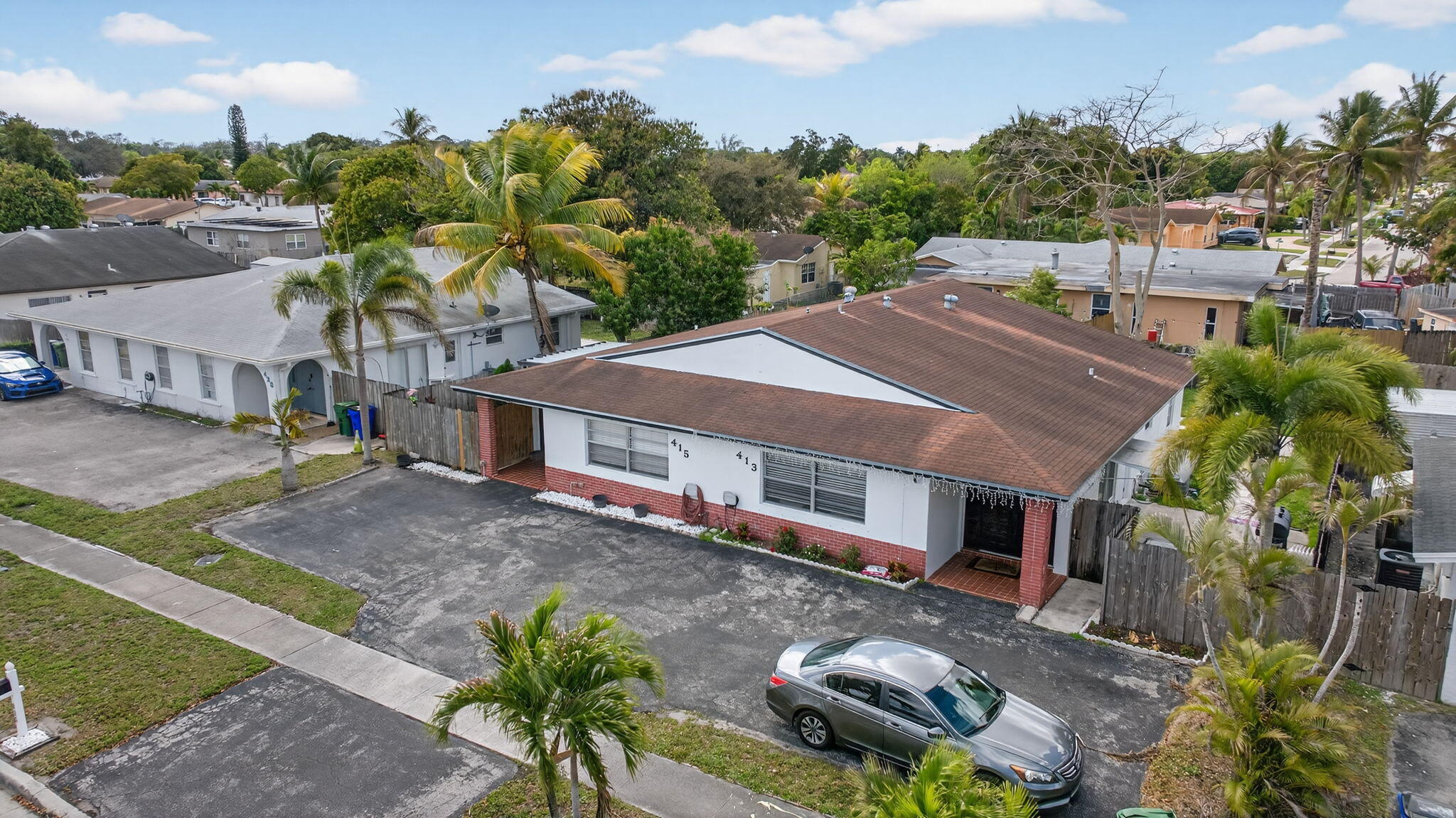 415 Southwest 61st Terrace Margate, FL 33068 - Photo 4 of 39 a aerial view of a house with a yard