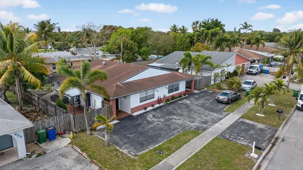 a aerial view of a house with a yard