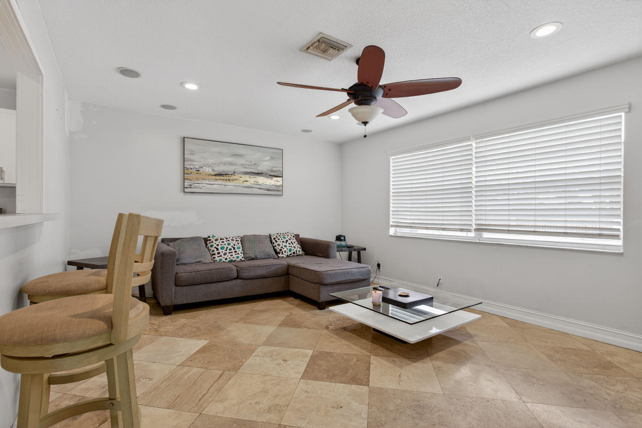 415 Southwest 61st Terrace Margate, FL 33068 - Photo 9 of 39 a living room with furniture and a window