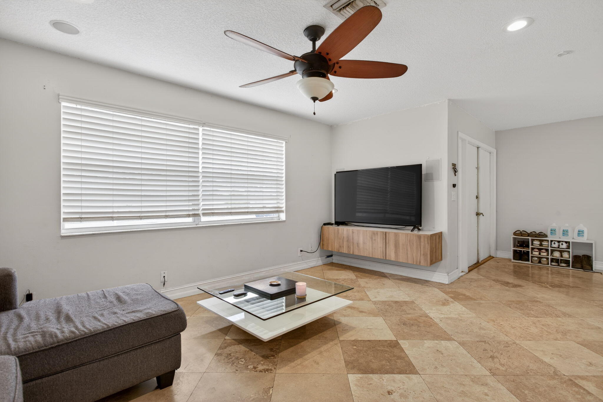 415 Southwest 61st Terrace Margate, FL 33068 - Photo 10 of 39 a living room with furniture and a flat screen tv