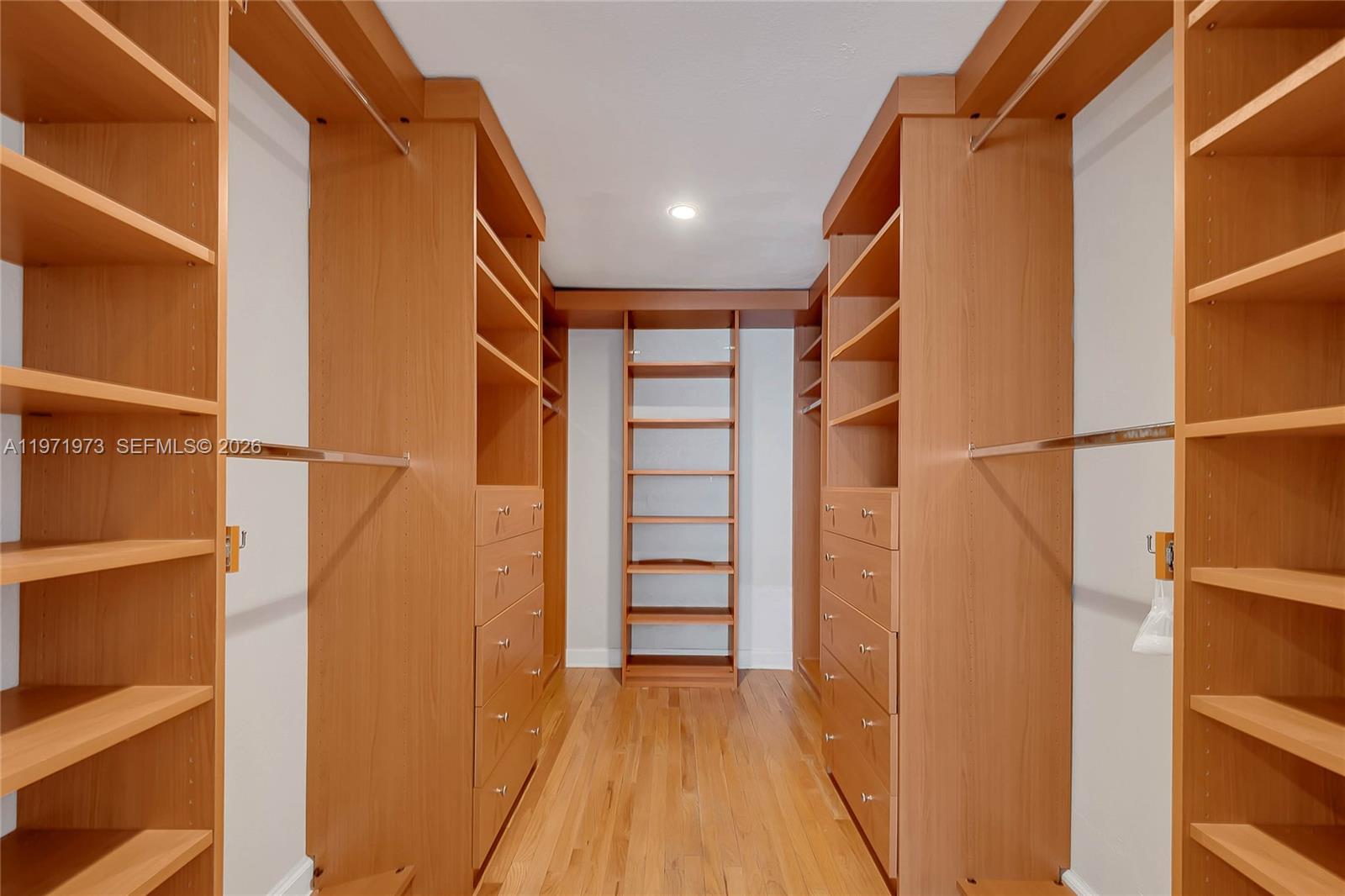 35 Southwest 20th Road Miami, FL 33129 - Photo 15 of 50 a view of walk in closet with empty racks