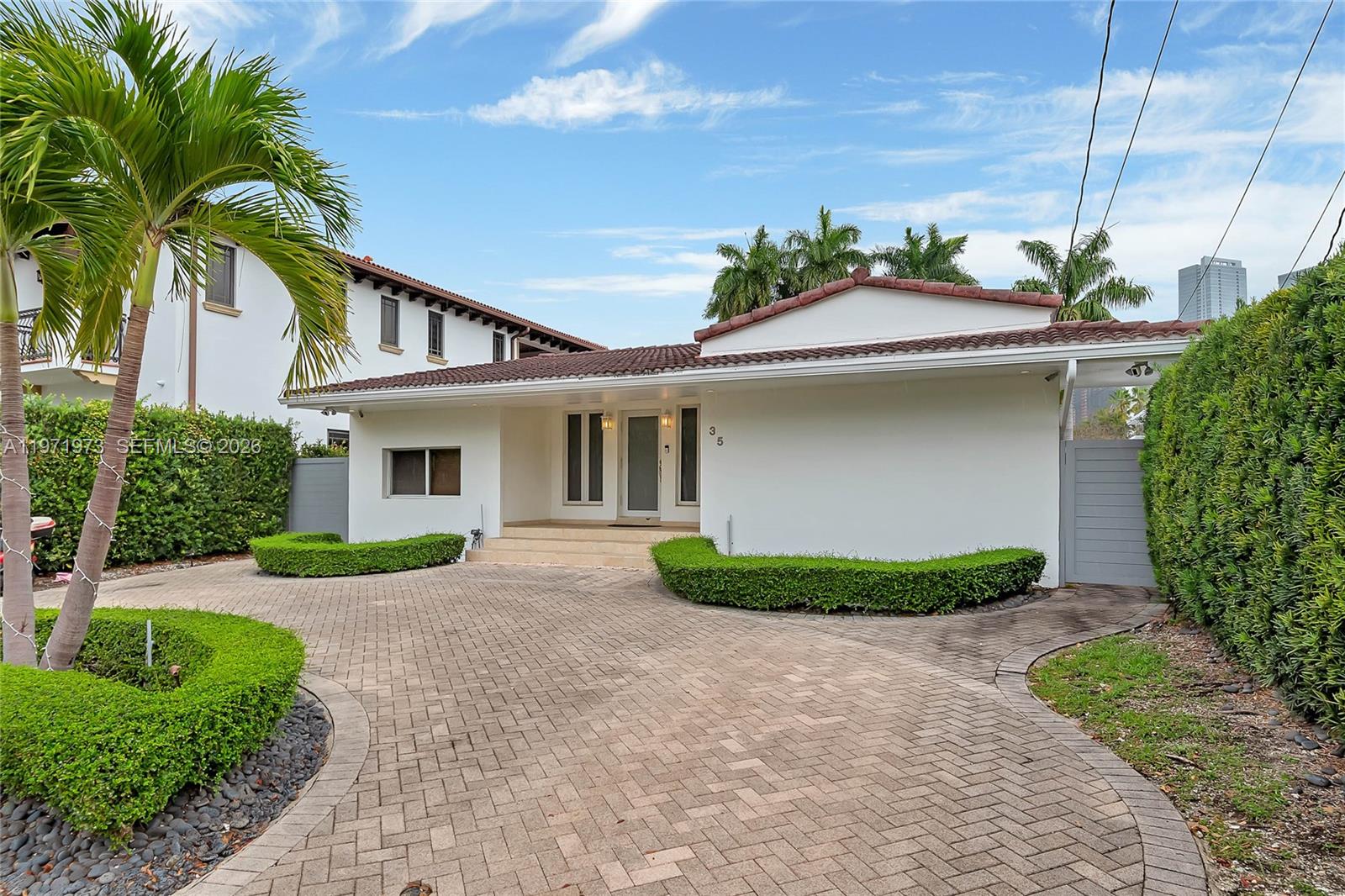 35 Southwest 20th Road Miami, FL 33129 - Photo 2 of 50 a front view of a house with garden