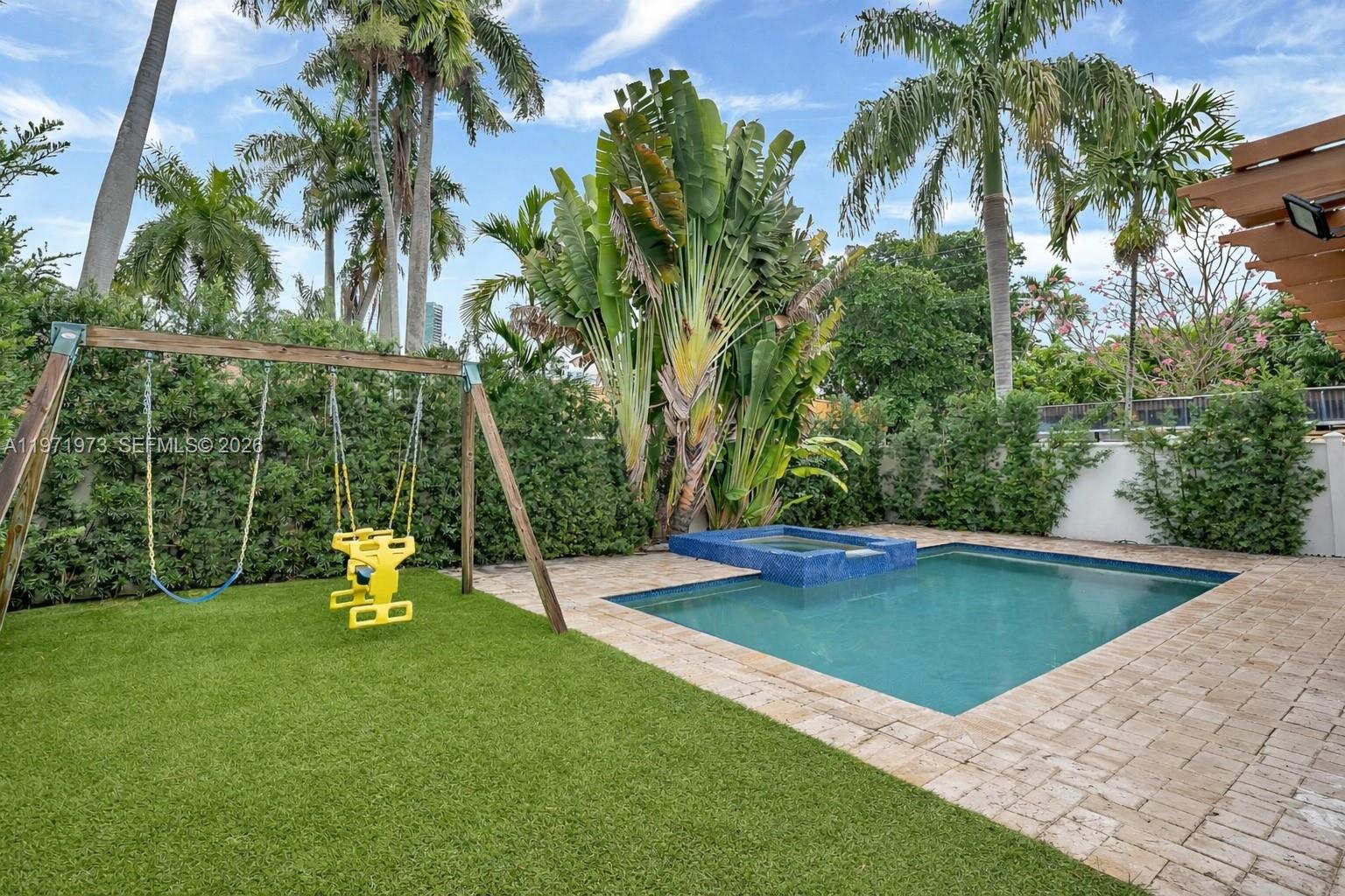 35 Southwest 20th Road Miami, FL 33129 - Photo 24 of 50 a view of a backyard with swimming pool
