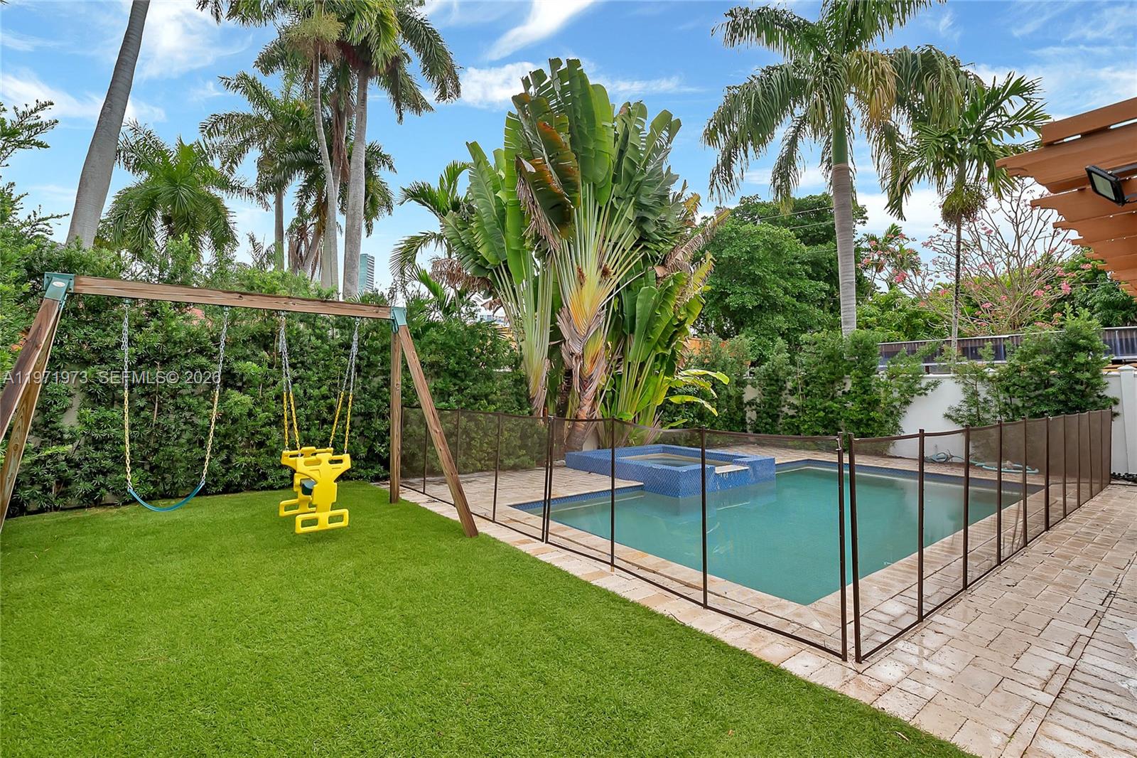 35 Southwest 20th Road Miami, FL 33129 - Photo 25 of 50 a garden with trees in front of it