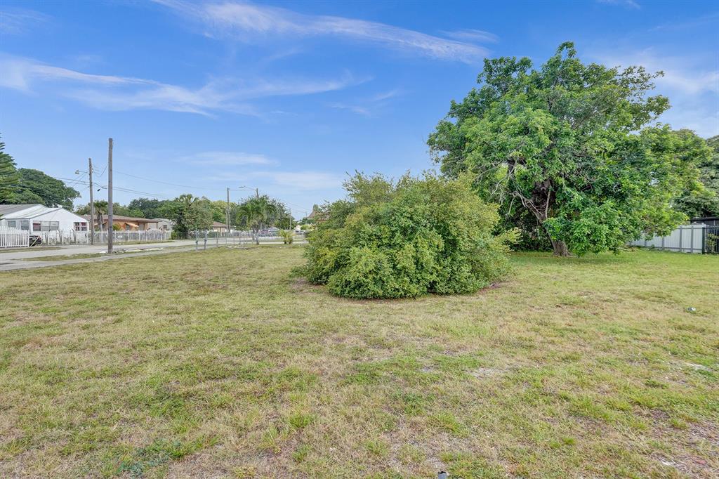 1895 Northwest 58th Street Miami, FL 33142 - Photo 11 of 14 a view of a field with an outdoor space