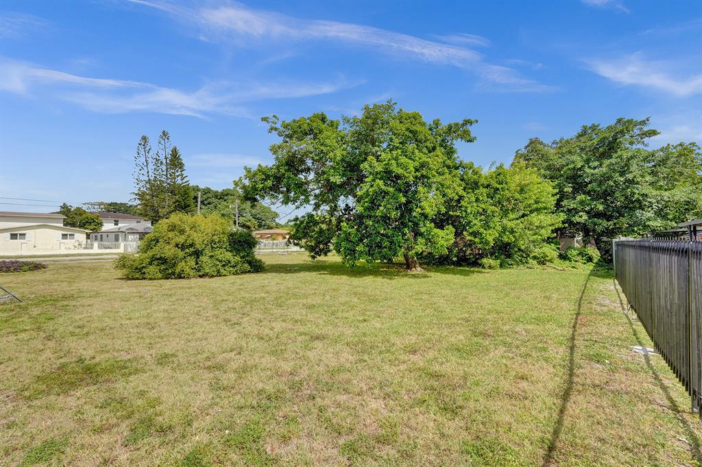 1895 Northwest 58th Street Miami, FL 33142 - Photo 14 of 14 a view of a yard with an outdoor space