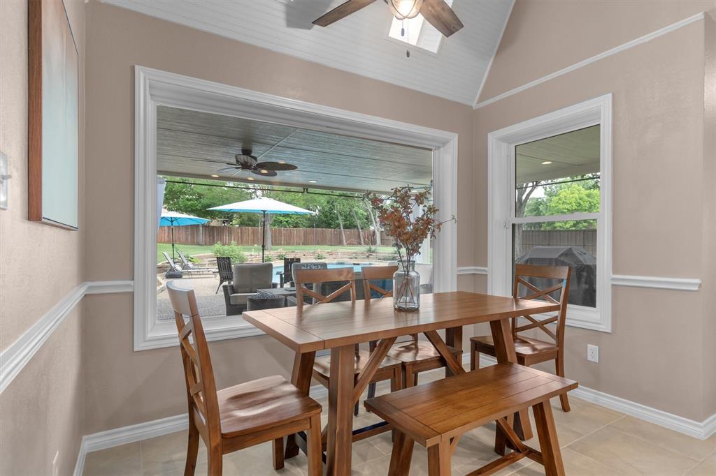 410 Simmons Road Double Oak, TX 75077 - Photo 16 of 40 Sun-drenched breakfast nook with lovely backyard views.