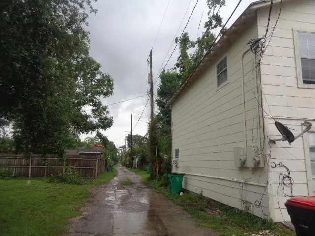a backyard of a house with lots of green space