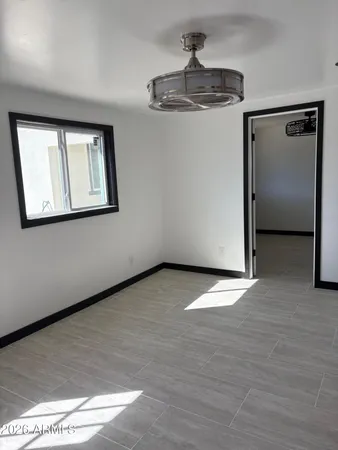 a view of a hallway with a chandelier