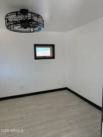 a view of a small space with a wooden floor