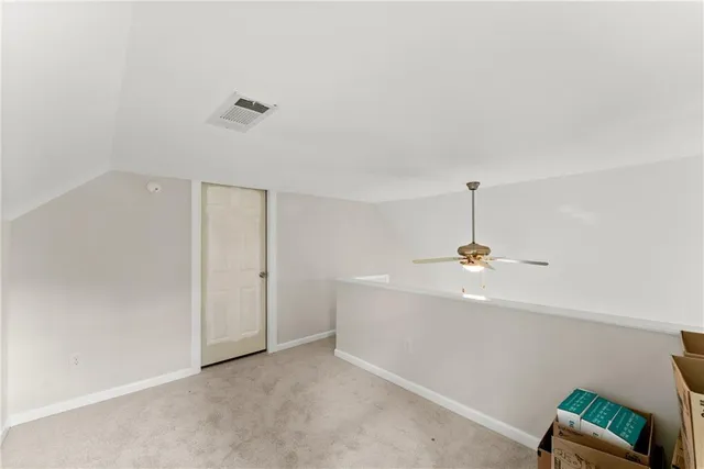 a view of an empty room with a sink