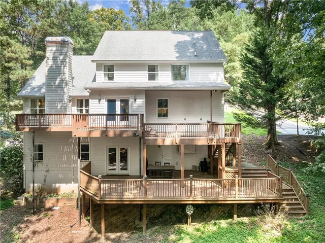 a front view of a house with a boat