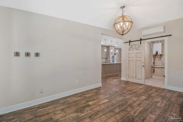 a bathroom with a shower sink and mirror