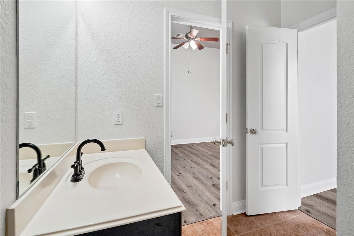 114 Aria Ridge, Unit 802 Lakeway, TX 78738 - Photo 22 of 30 a close view of sink and tap