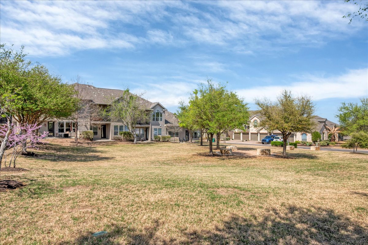 114 Aria Ridge, Unit 802 Lakeway, TX 78738 - Photo 30 of 30 a view of a street with houses