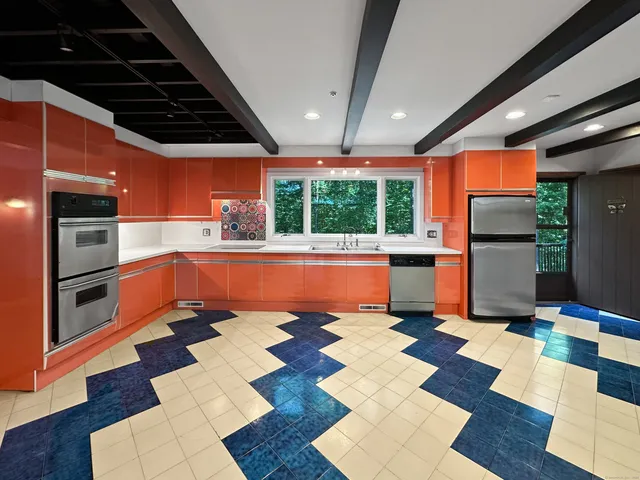 a view of swimming pool with a rug