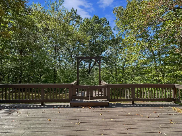 a view of swimming pool with sitting area