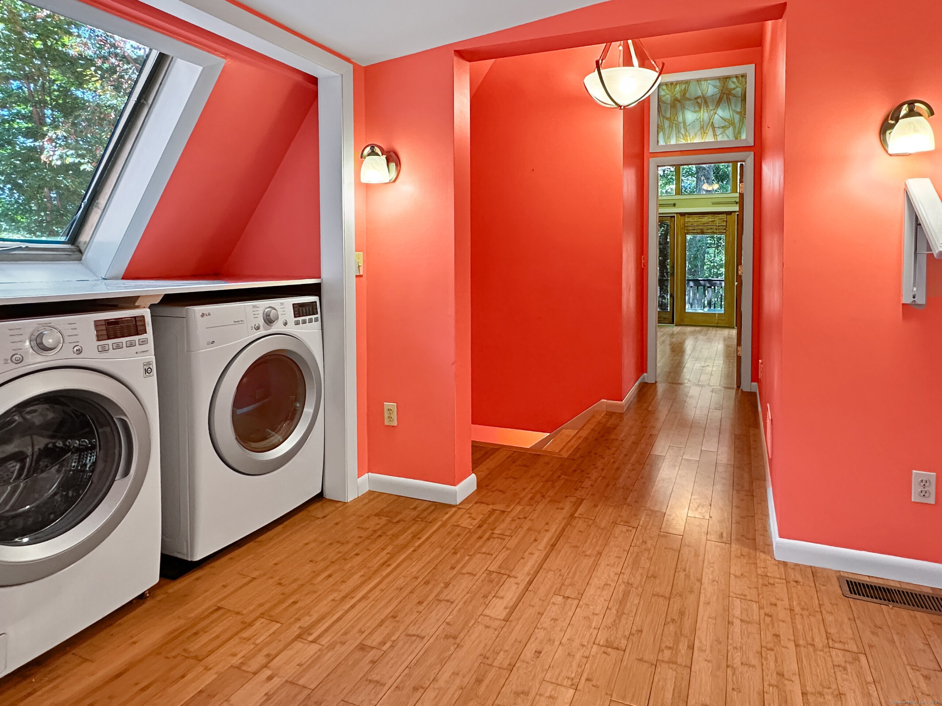 301 Bell Street Middletown, CT 06457 - Photo 20 of 40 a view of a bedroom with washer and dryer