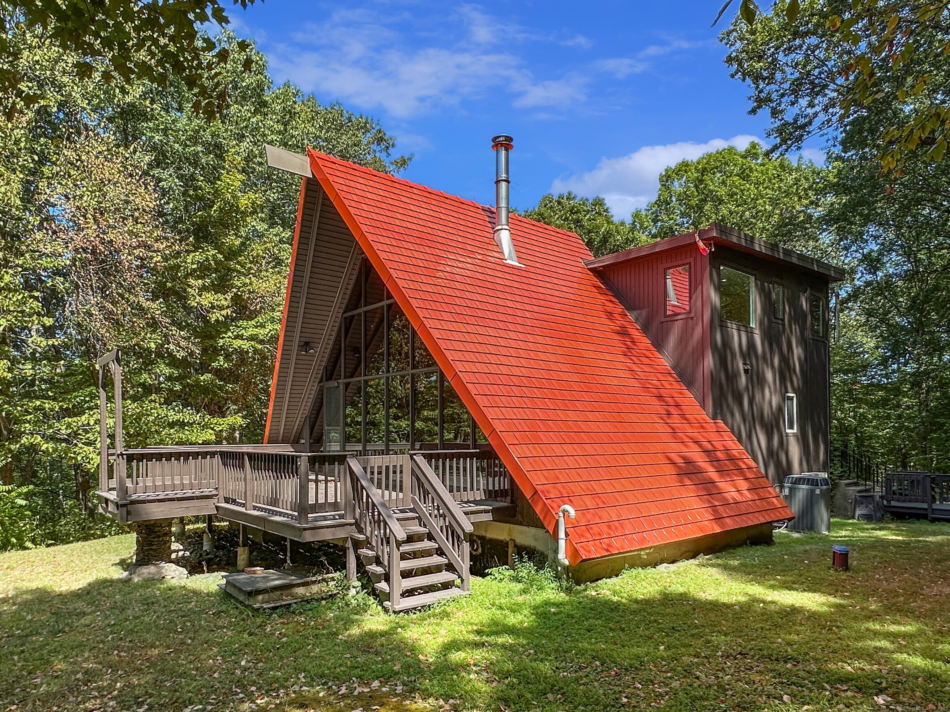 301 Bell Street Middletown, CT 06457 - Photo 2 of 40 a view of a house with a backyard