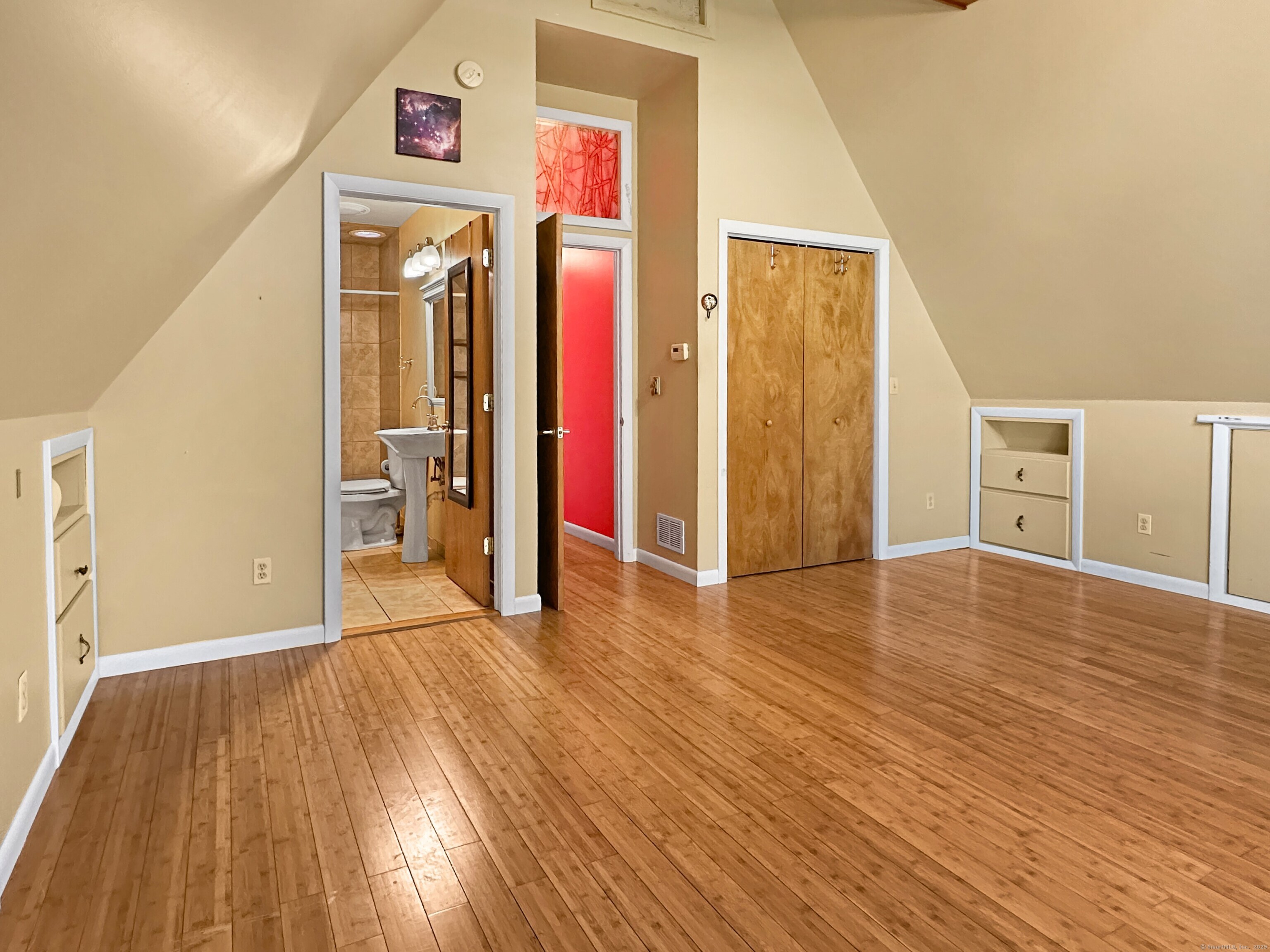 301 Bell Street Middletown, CT 06457 - Photo 22 of 40 a view of a hallway with wooden floor