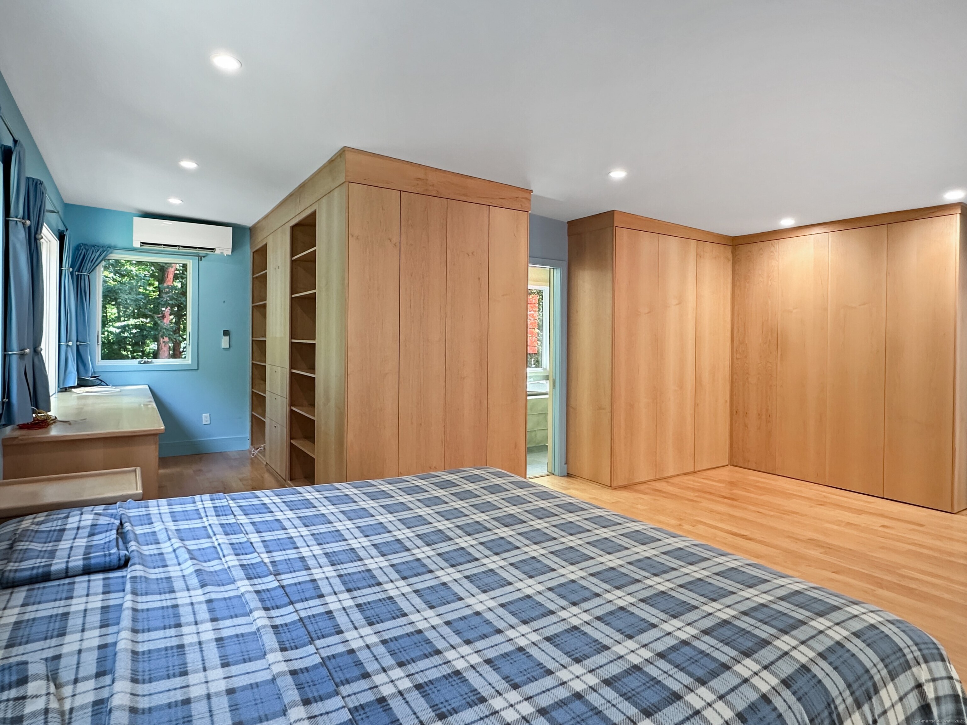 301 Bell Street Middletown, CT 06457 - Photo 27 of 40 a bedroom with a large bed and a dresser