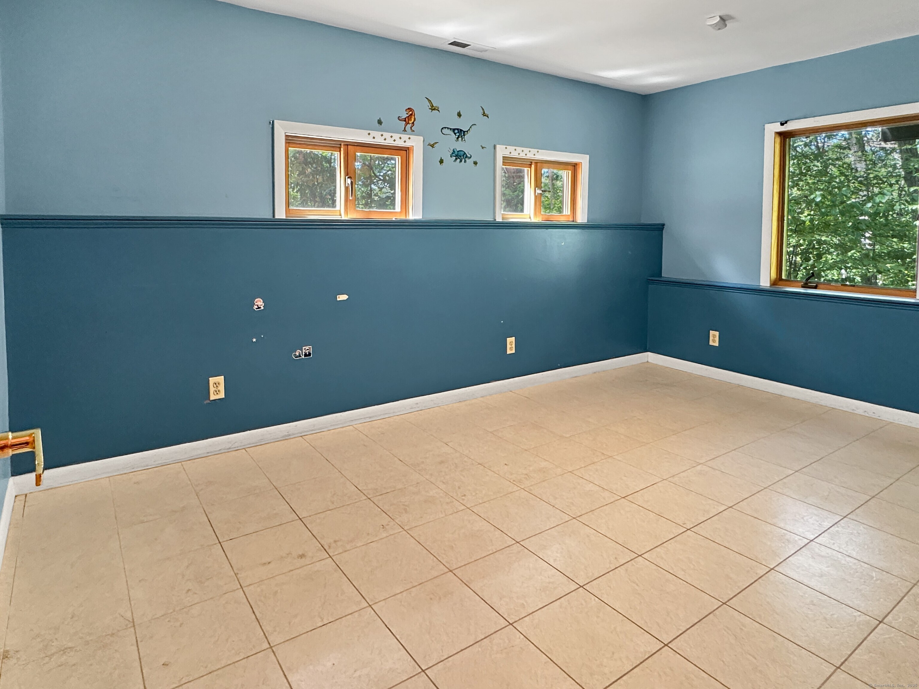 301 Bell Street Middletown, CT 06457 - Photo 35 of 40 a view of an empty room with windows