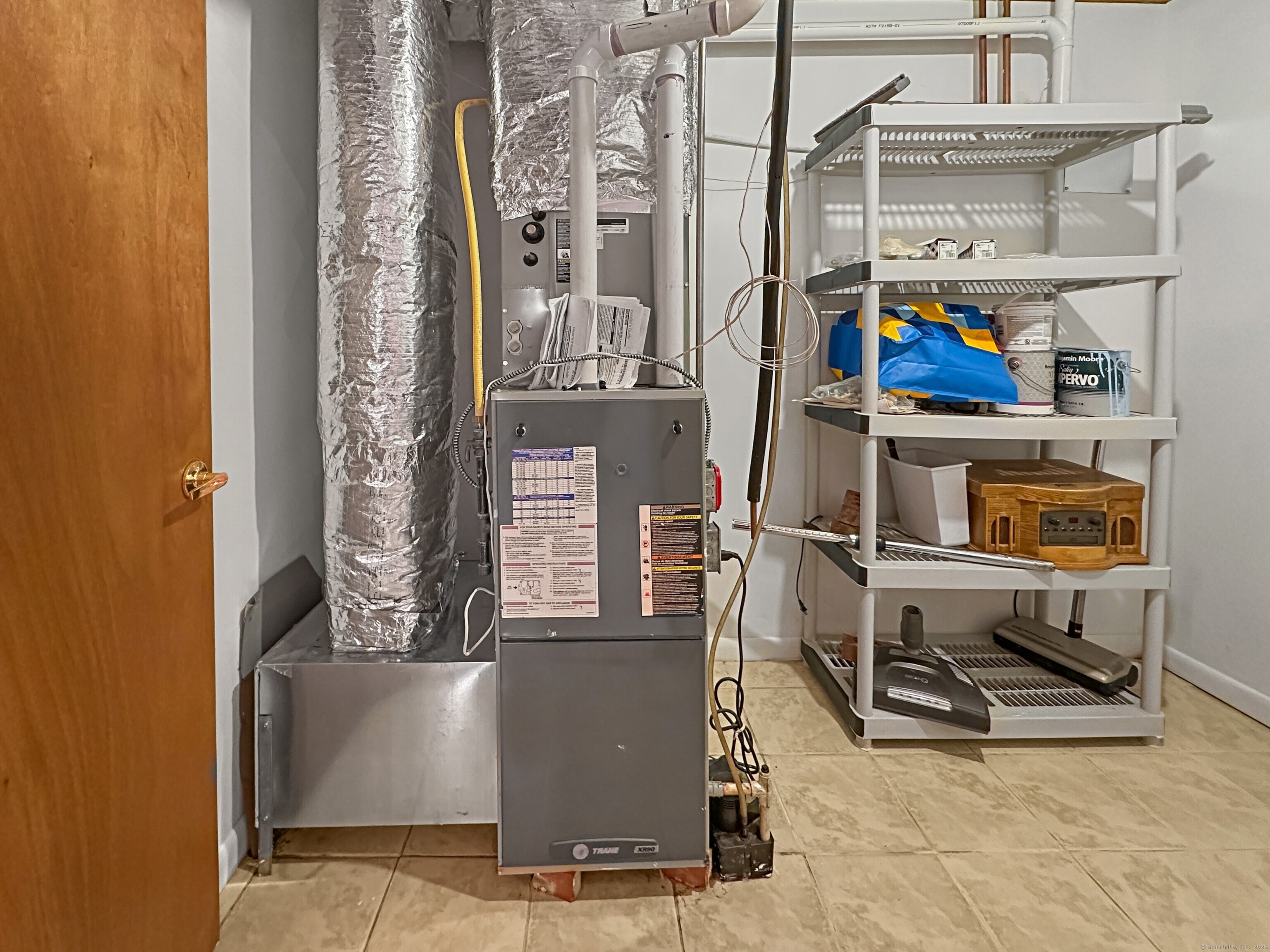 301 Bell Street Middletown, CT 06457 - Photo 36 of 40 a view of a room with racks on the wall