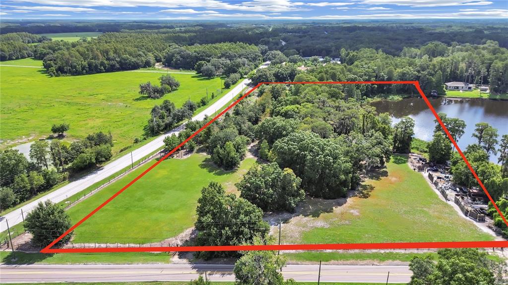 18117 Boy Scout Road Odessa, FL 33556 - Photo 1 of 15 a view of a garden with flowers