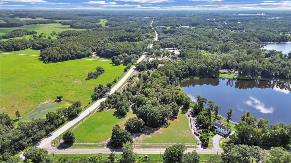 18117 Boy Scout Road Odessa, FL 33556 - Photo 2 of 15 an aerial view of residential houses with outdoor space and river
