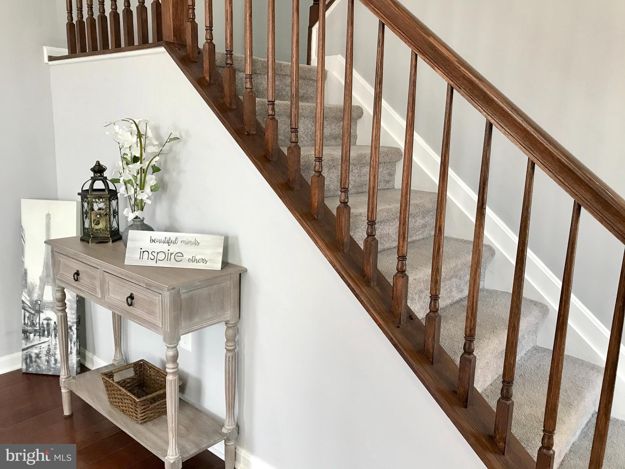 509 Middle River Road Baltimore, MD 21220 - Photo 16 of 37 ENTRYWAY WITH STAIRS TO UPPER LEVEL