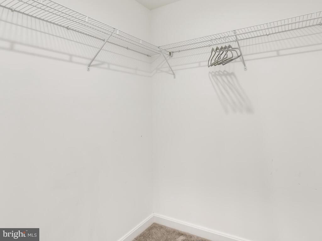 509 Middle River Road Baltimore, MD 21220 - Photo 20 of 37 OWNER'S SUITE WALK-IN CLOSET