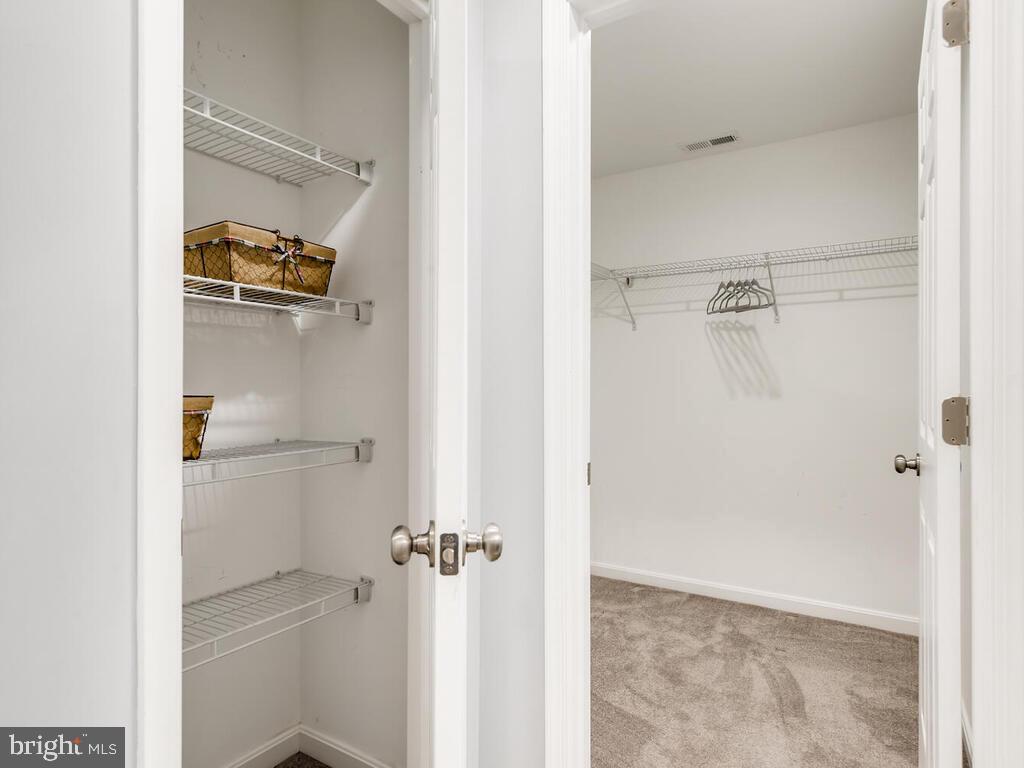 509 Middle River Road Baltimore, MD 21220 - Photo 21 of 37 OWNER'S SUITE 2ND WALK-IN CLOSET + LINEN CLOSET