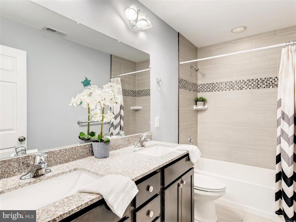 509 Middle River Road Baltimore, MD 21220 - Photo 25 of 37 2ND FULL BATH (UPPER LEVEL)
