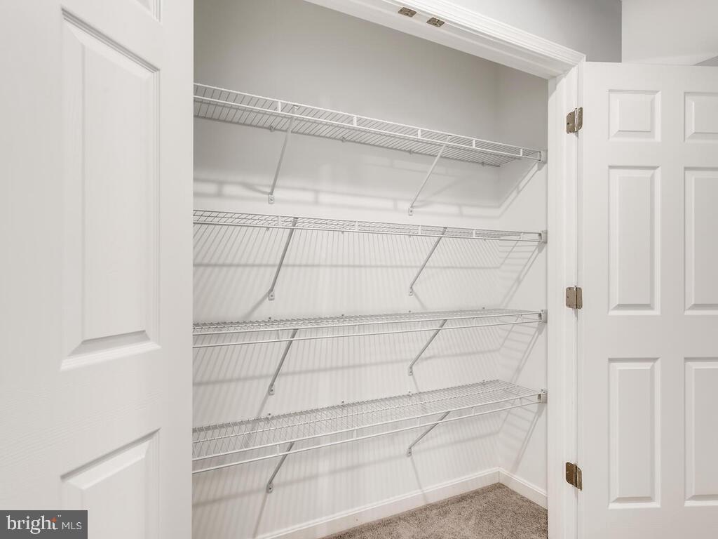 509 Middle River Road Baltimore, MD 21220 - Photo 27 of 37 MASSIVE HALL CLOSET (UPPER LEVEL)