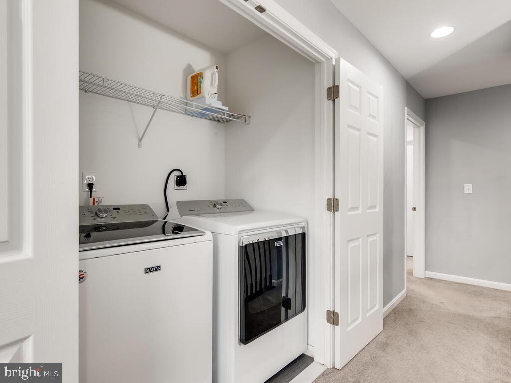 509 Middle River Road Baltimore, MD 21220 - Photo 28 of 37 LAUNDRY RM w/COMMERCIAL W/D & SHELVING (UPPER LVL)