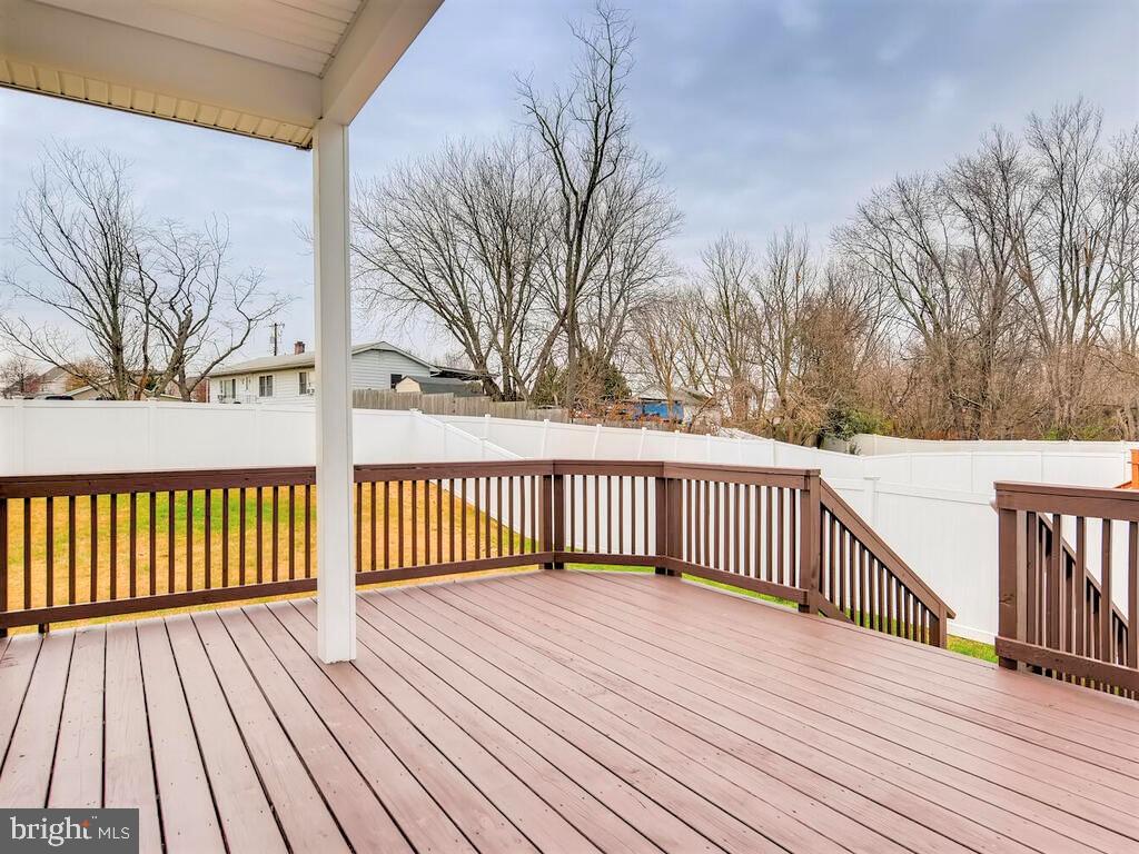 509 Middle River Road Baltimore, MD 21220 - Photo 30 of 37 ENTERTAINING DECK w/WALK-DOWN TO FENCED YARD