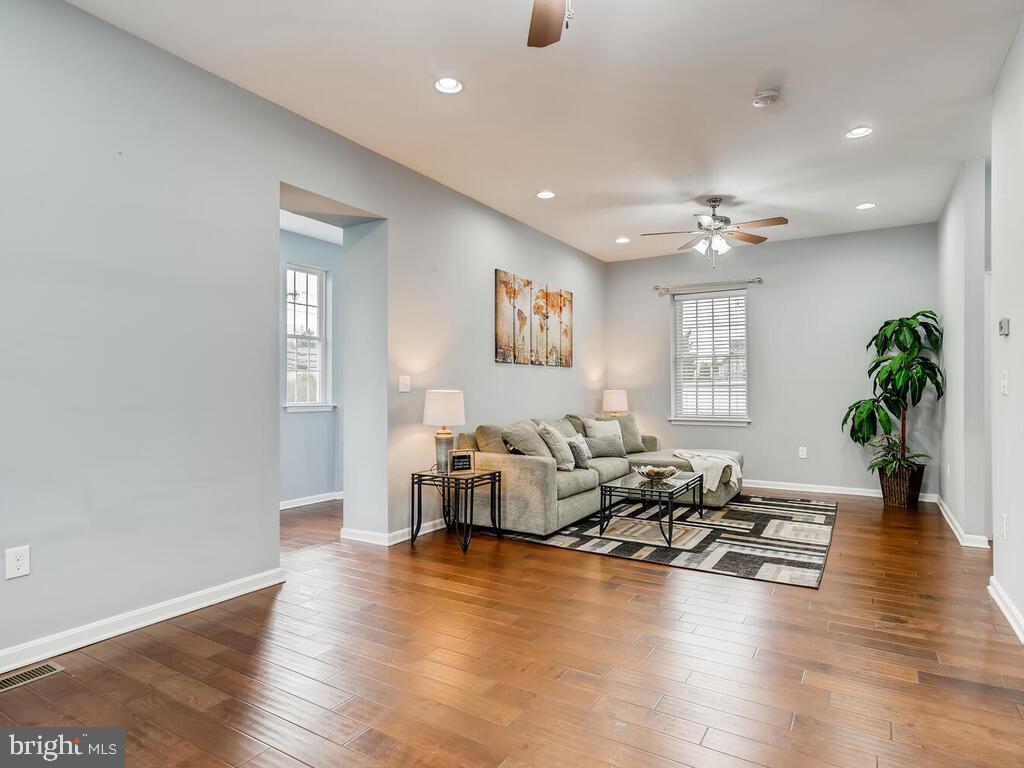509 Middle River Road Baltimore, MD 21220 - Photo 5 of 37 LIVING & SITTING RMS, HARDWOODS & RECESSED LIGHTS