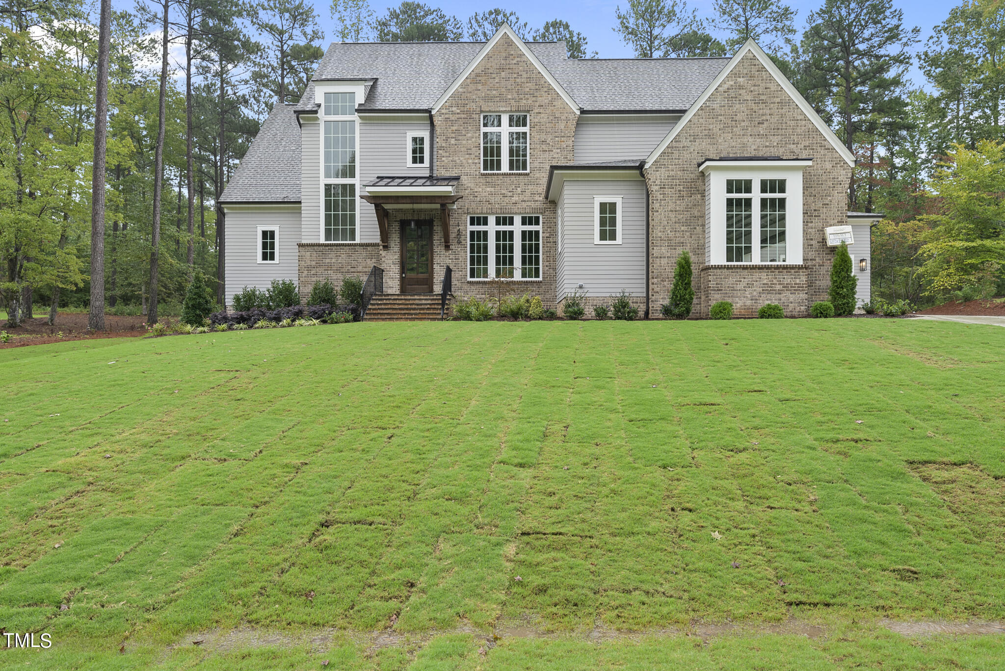1409 Starry Night Court Raleigh, NC 27613 - Photo 1 of 35 front view of a house with a yard