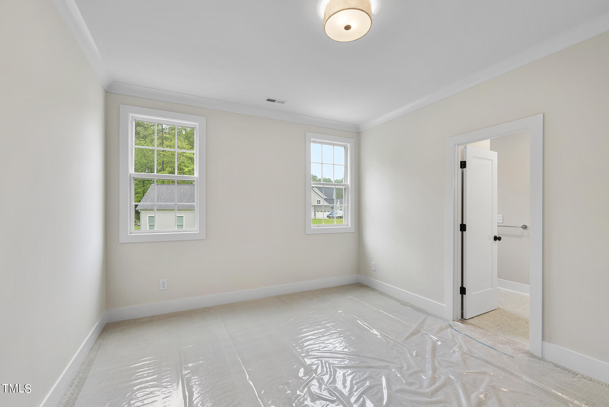 1409 Starry Night Court Raleigh, NC 27613 - Photo 17 of 35 a view of a bedroom with window