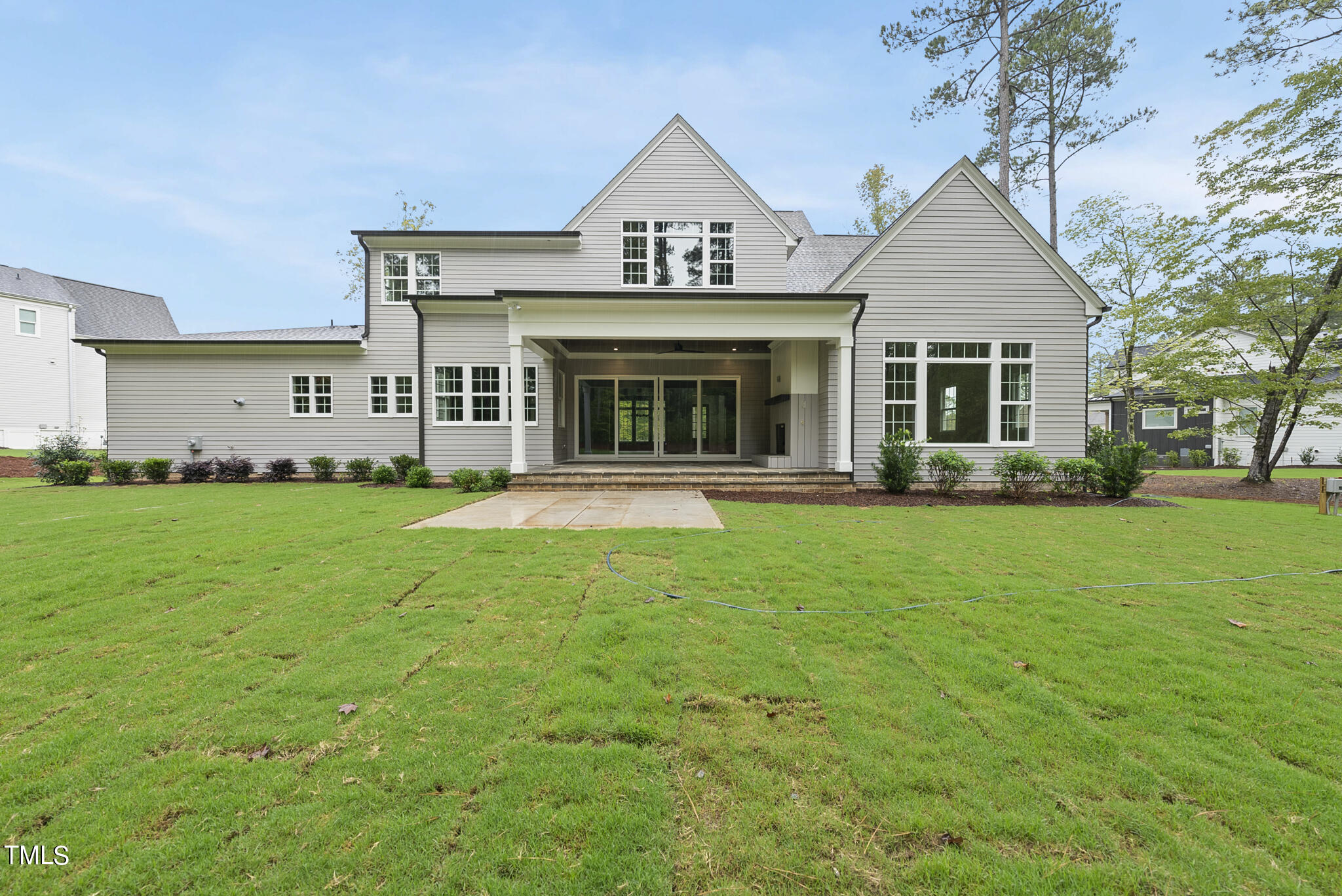 1409 Starry Night Court Raleigh, NC 27613 - Photo 21 of 35 a front view of a house with garden
