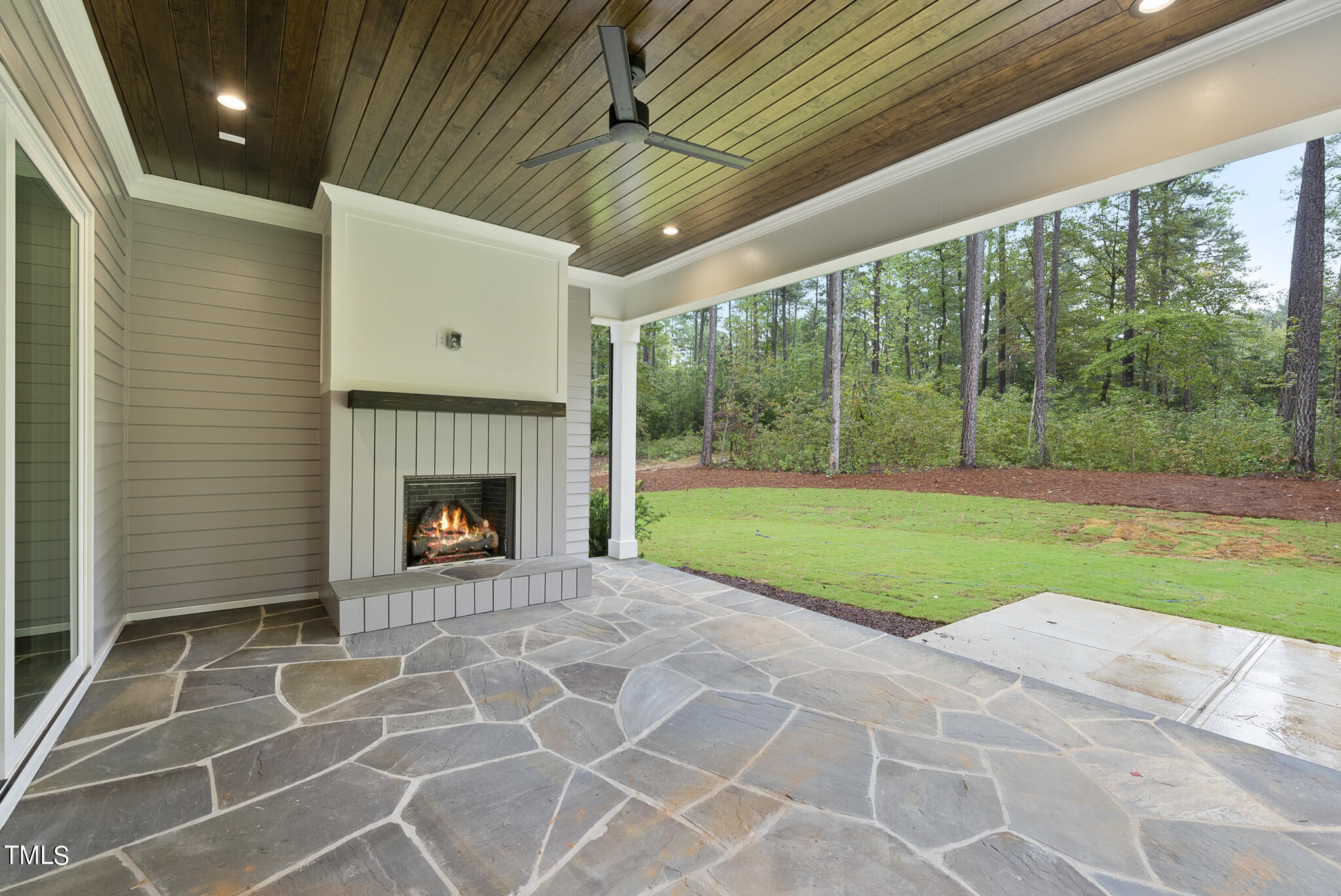 1409 Starry Night Court Raleigh, NC 27613 - Photo 33 of 35 a view of a porch with a yard