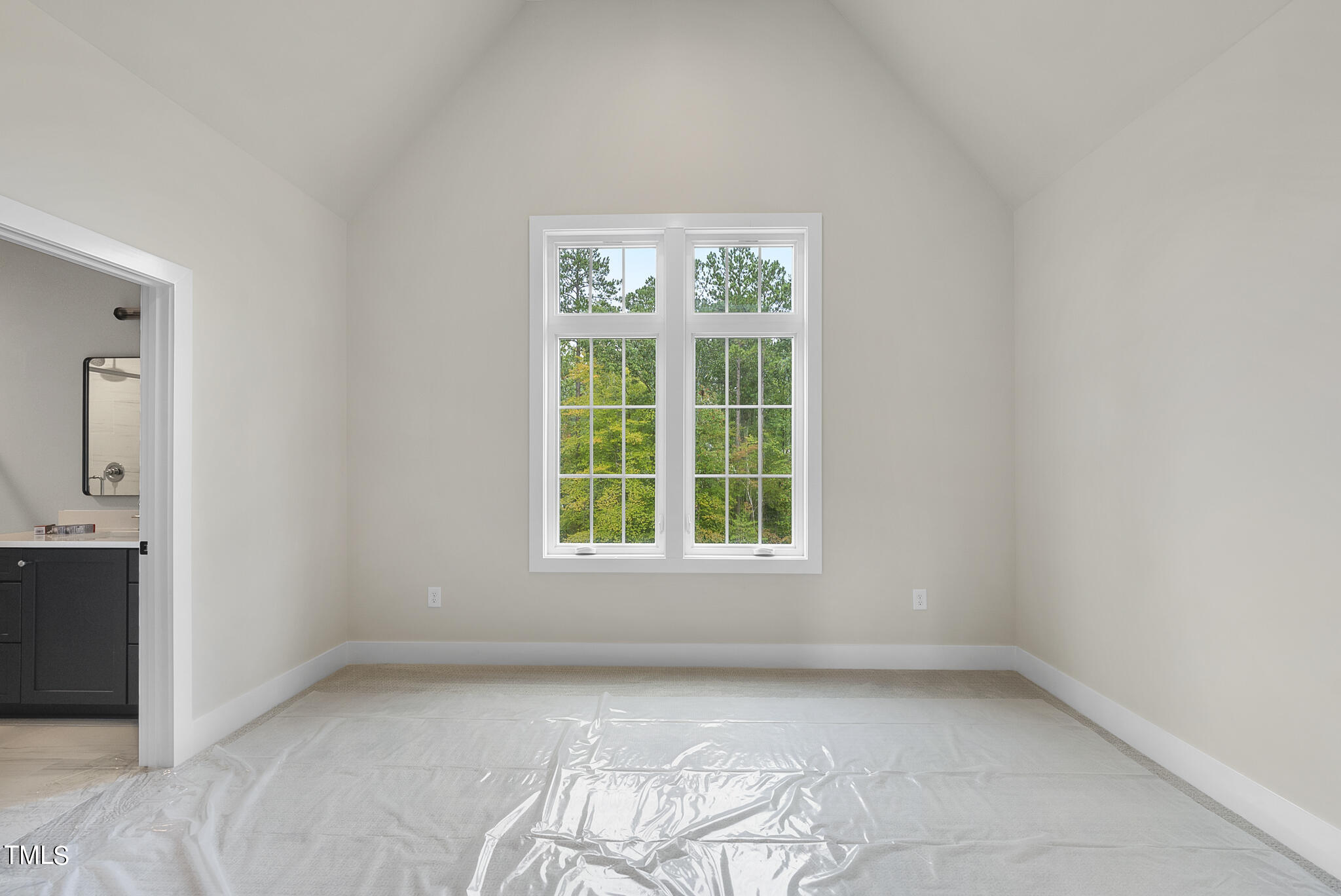 1409 Starry Night Court Raleigh, NC 27613 - Photo 10 of 35 an empty room with a window