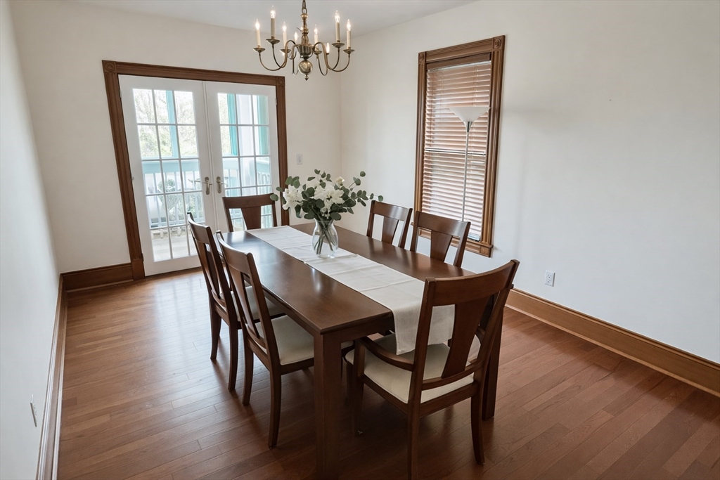 53 Hillside Street, Unit 3 Boston, MA 02120 - Photo 2 of 10 a view of a dining room with furniture window and wooden floor