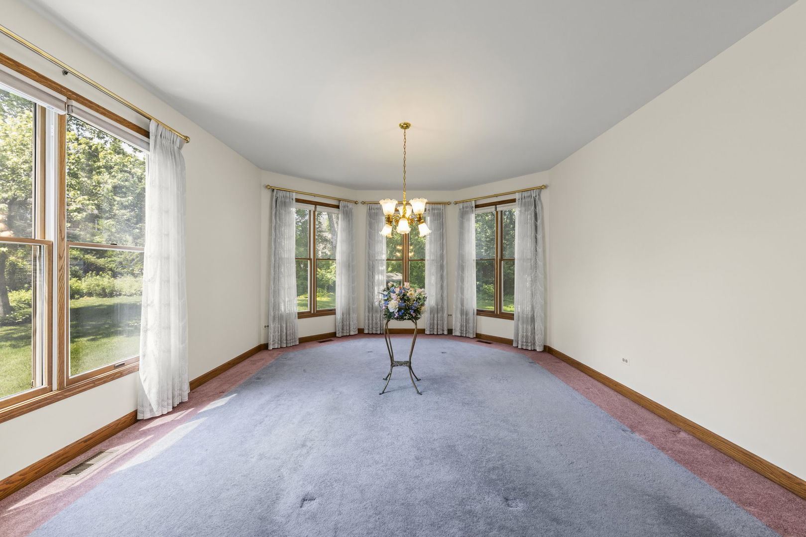 18040 Perth Avenue Homewood, IL 60430 - Photo 18 of 44 an empty room with windows and outdoor view