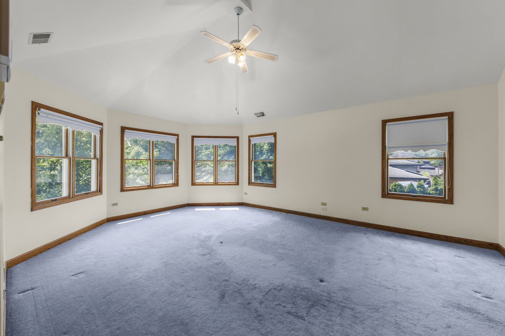 18040 Perth Avenue Homewood, IL 60430 - Photo 22 of 44 an empty room with chandelier fan and windows