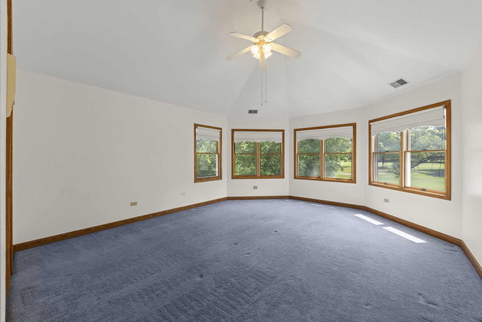 18040 Perth Avenue Homewood, IL 60430 - Photo 23 of 44 an empty room with chandelier fan and windows